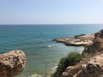 Scenic view of sea against clear sky