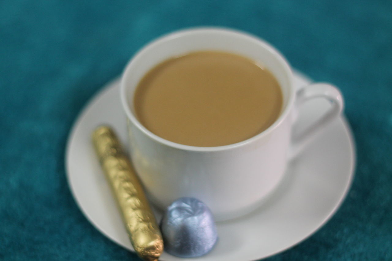 food and drink, indoors, still life, coffee cup, table, drink, refreshment, freshness, spoon, saucer, coffee - drink, close-up, cup, coffee, high angle view, healthy eating, directly above, tea cup, no people, food