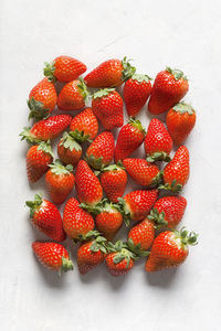 High angle view of strawberries on table