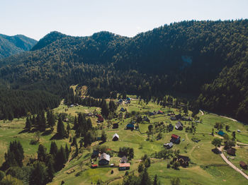 High angle view of trees and houses against sky