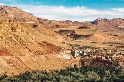 Panorama of canyon, palm trees and ancient berber village of tinghir in sahara desert , morocco