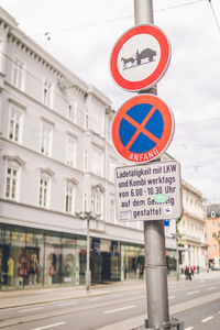 Information sign on road in city