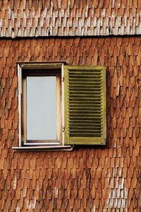 Full frame shot of window on wall of building