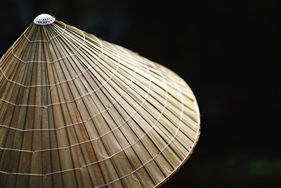 Close-up of asian style conical hat