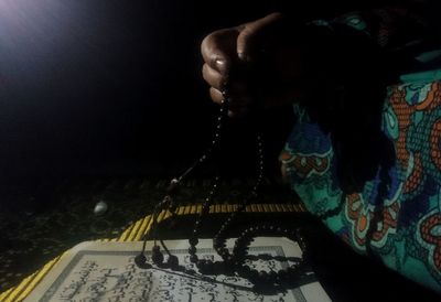 Close-up portrait of woman at night