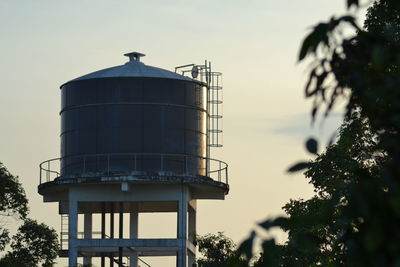 Low angle view of water tower against sky