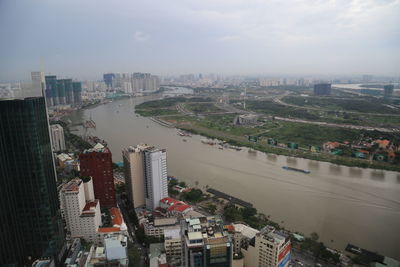 High angle view of buildings in city against sky