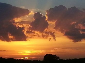 Scenic view of landscape at sunset