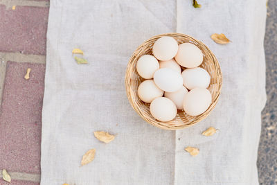 High angle view of eggs in basket