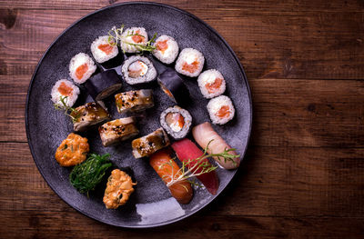 Directly above shot of sushi served in plate