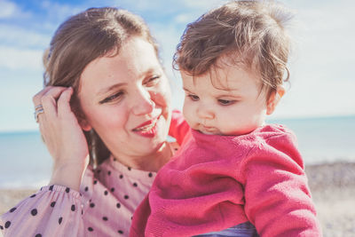 Mother and daughter at beach