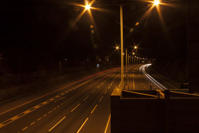 Light trails on road at night