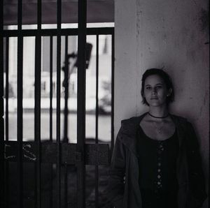 Portrait of young woman standing outdoors