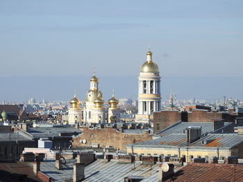 View of buildings in city against sky