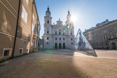 The cathedral of salzburg, austria surrounded by empty squares during the corona virus crisis.