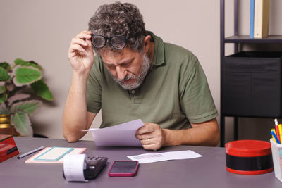 Young man working at office