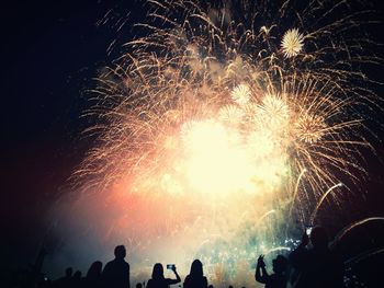 Firework display at night