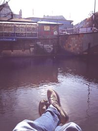 Low section of woman in river