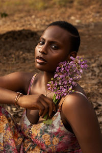 Portrait of beautiful young woman outdoors