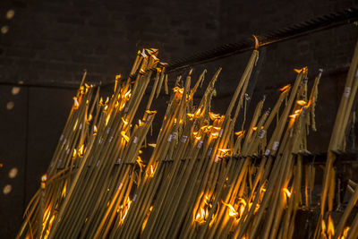 Low angle view of illuminated lights at night