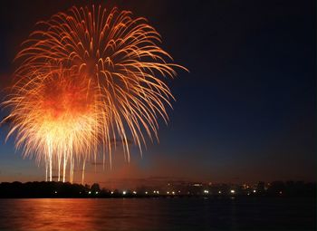 Firework display at night