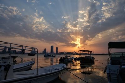 View of harbor at sunset