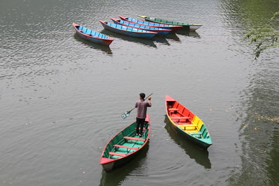 High angle view of people on boat in river