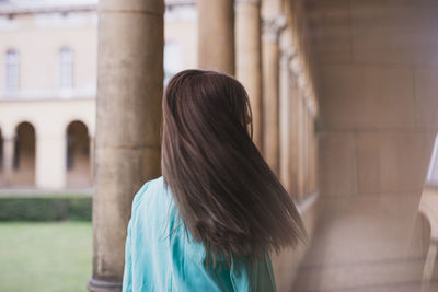 Rear view of woman looking away