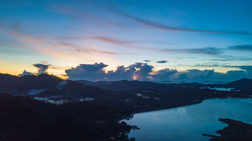 Aerial view of kenyir lake during blue hour sunrise.