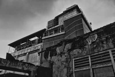 Low angle view of old building against sky