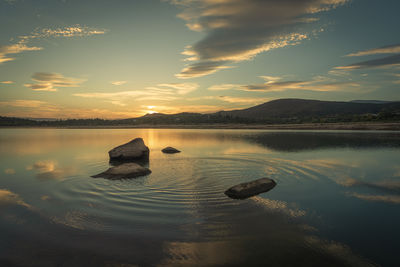 Scenic view of sea against sky during sunset