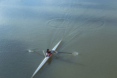 High angle view of man surfing in sea