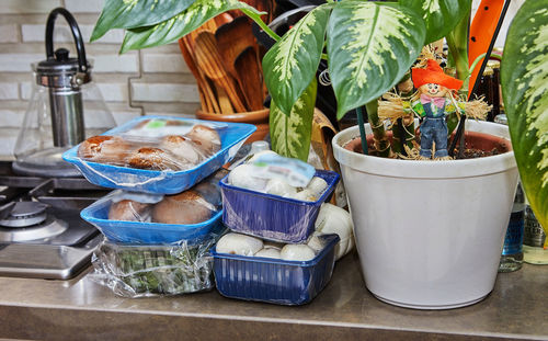 Packaged food is ready for cooking on the countertop in the kitchen