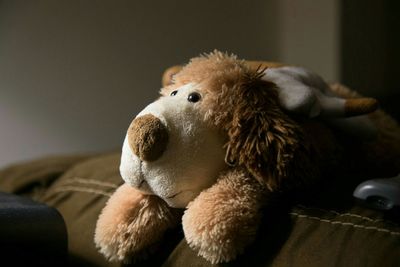 Close-up of stuffed toy on bed at home