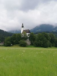 Built structure by building against sky