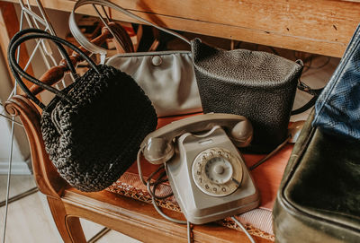 High angle view of telephone on table at home