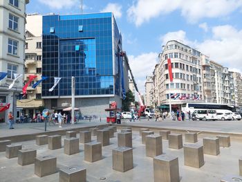 Buildings in city against sky