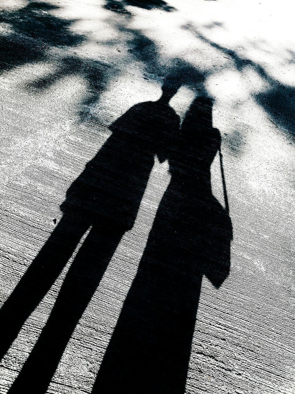 SHADOW OF PEOPLE ON HAND