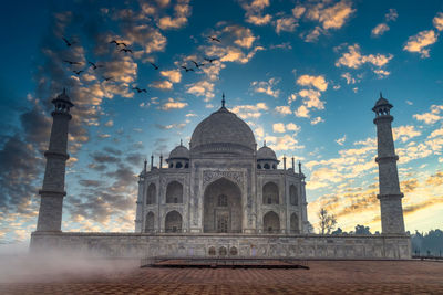 Taj mahal is an ivory white marble mausoleum on yamuna river, agra, uttar pradesh, india.