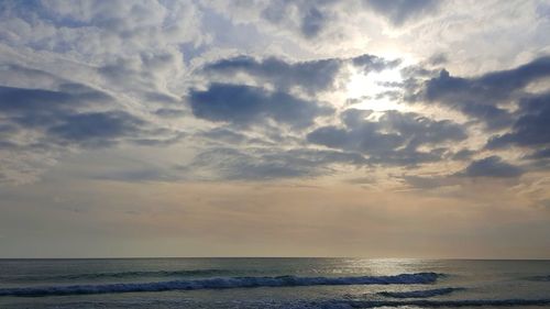 Scenic view of sea against sky at sunset