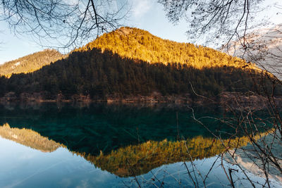 Scenic view of lake against sky during autumn