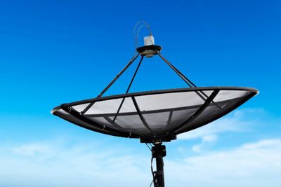 Low angle view of street light against sky