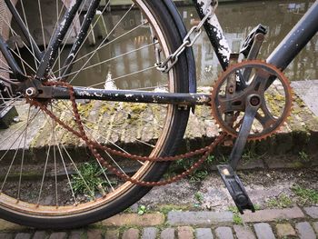 Close-up of rusty bicycle wheel