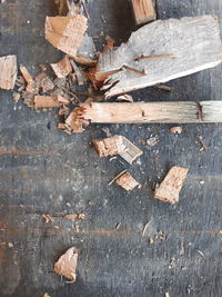 High angle view of arrow symbol on wooden table