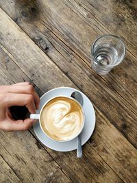 High angle view of coffee cup on table