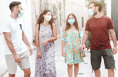 Young couples walking on street