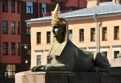 Close-up of statue against temple