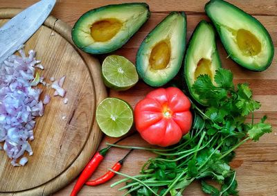 High angle view of vegetables on cutting board