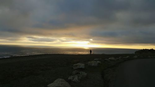 Scenic view of sea against cloudy sky