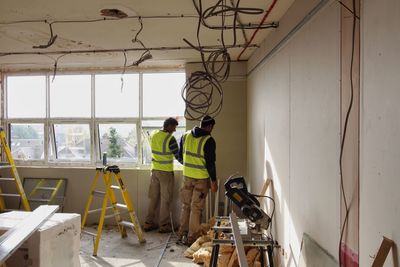 Full length of woman standing in pond